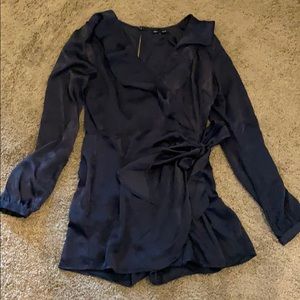 Navy long sleeve romper with simple ruffle overlay